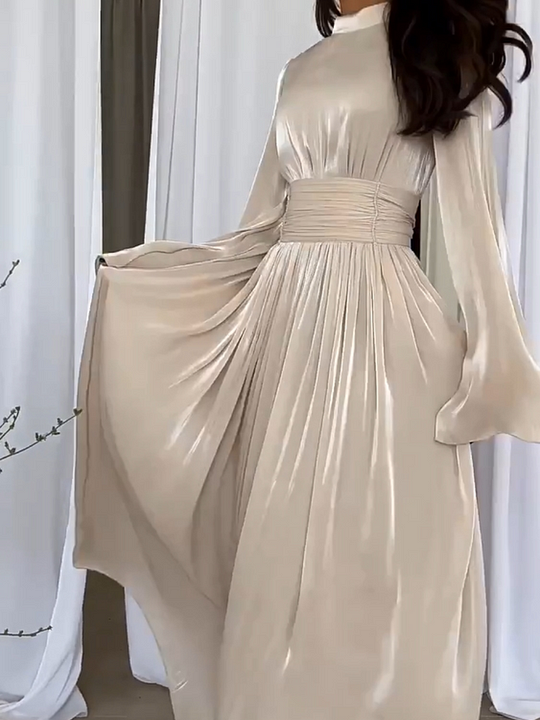 Feminine women's flowing maxi dress, an elegant & versatile summer piece for comfortable, stylish wear.
