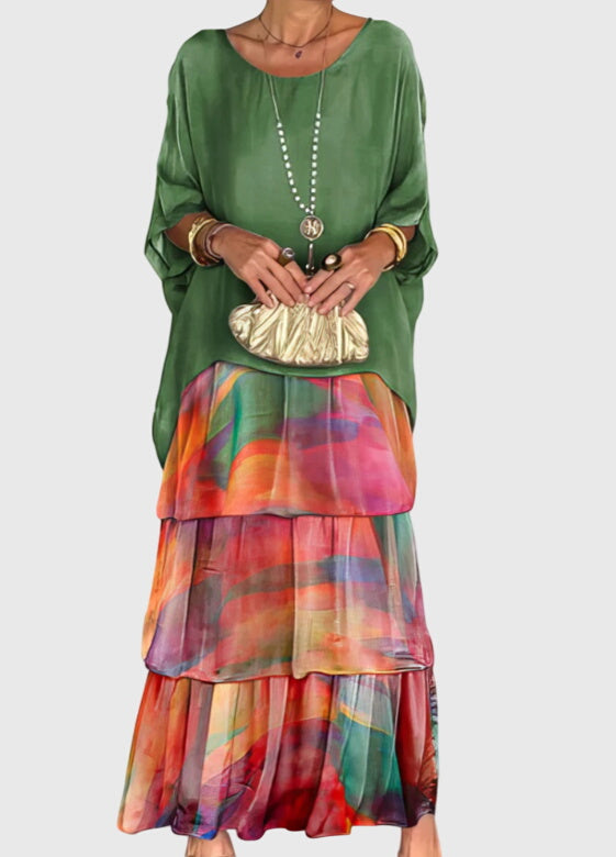 Elegant women's flowing maxi dress with relaxed fit, button-up front & half sleeves for formal events.