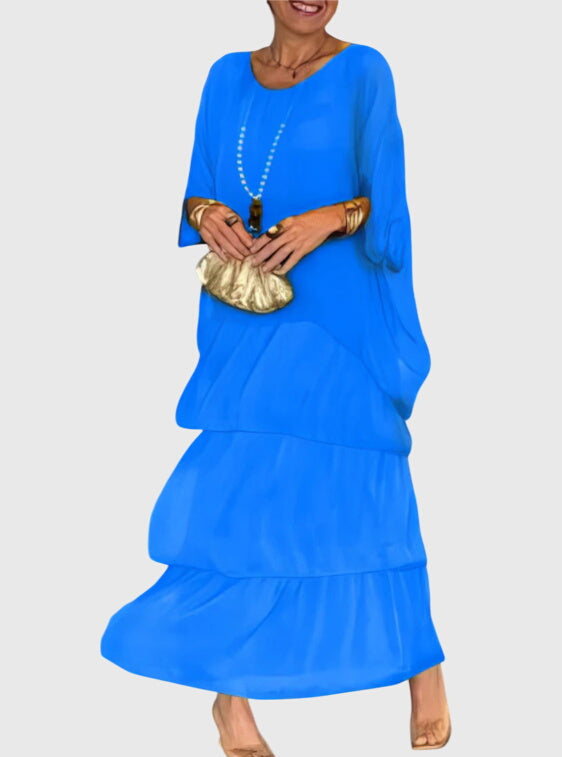 Elegant women's flowing button-up maxi dress, relaxed fit, half-sleeve, perfect for formal events.