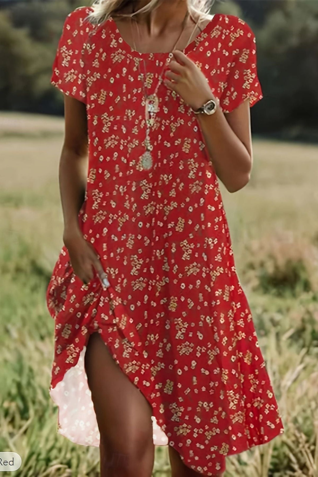 Elegant women's flowing midi dress for special occasions, sophisticated style, relaxed fit formal wear.