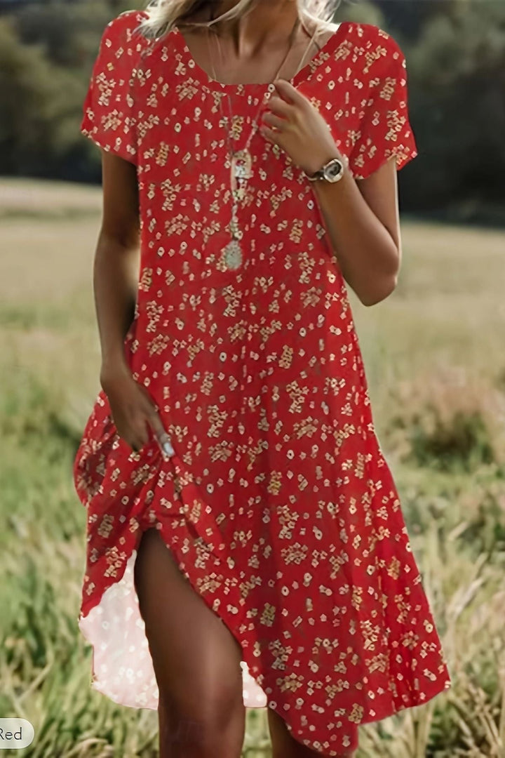 Elegant women's flowing midi dress for special occasions, sophisticated style, relaxed fit formal wear.