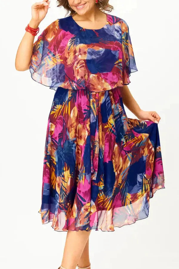 Elegant women's flowing midi dress in a timeless style, perfect for versatile day or evening wear.
