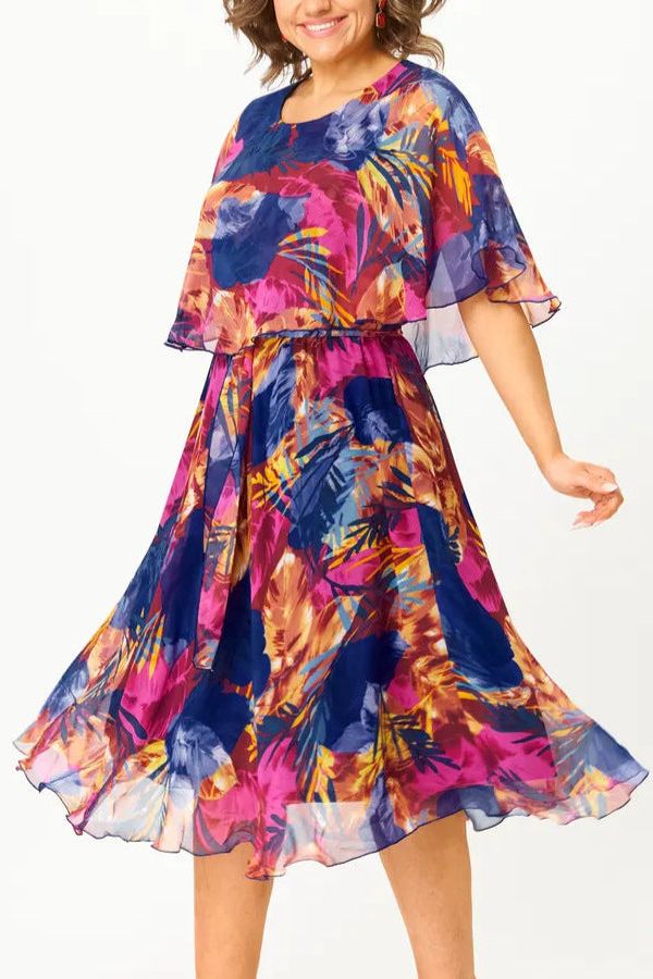 Comfortable women's midi dress with a graceful flowing silhouette, ideal for summer and casual events.