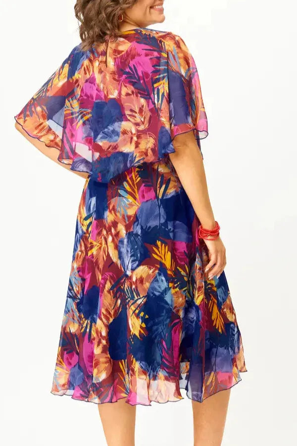 Chic women's flowing midi dress, combining comfort with sophisticated design for any elegant occasion.