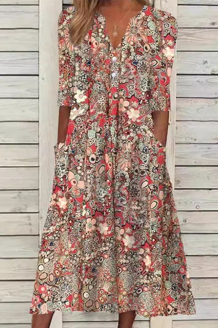 Elegant women's flowing printed midi dress. Comfortable & versatile for spring & summer casual or semi-formal wear.