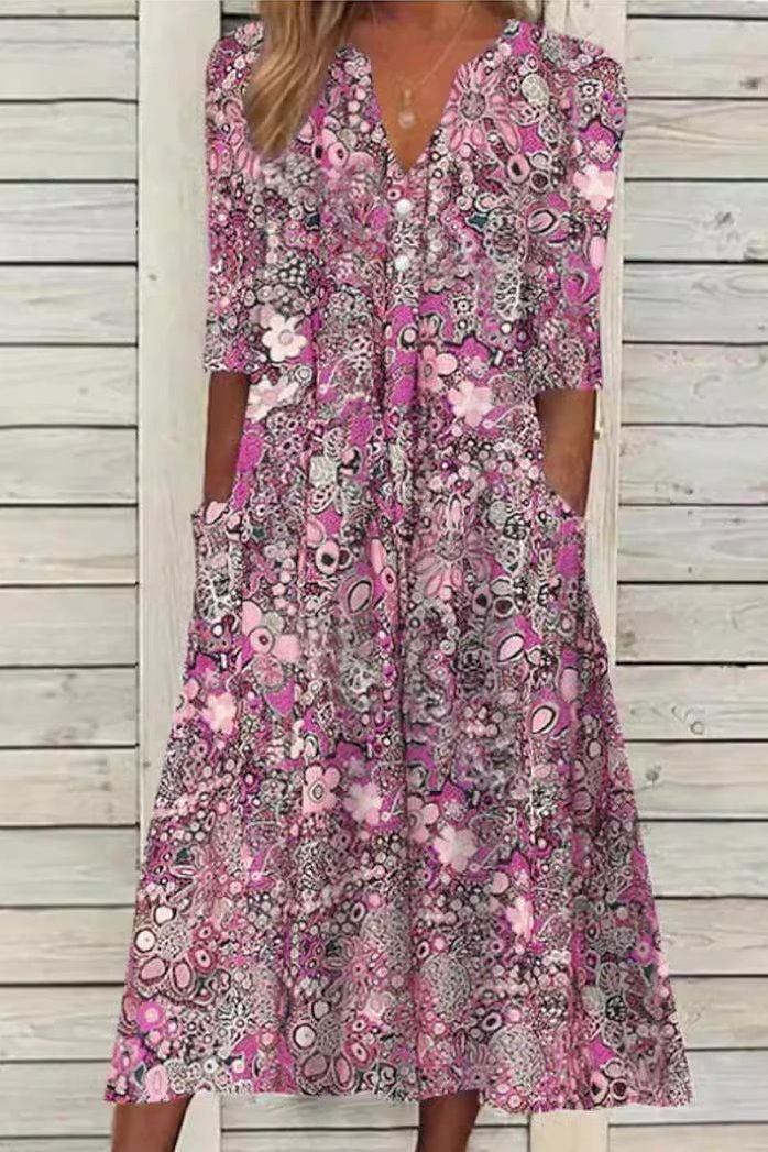 Model wearing a comfortable women's elegant printed midi dress, perfect for flowing spring & summer fashion.