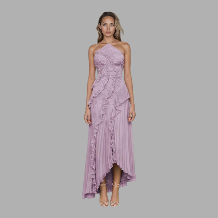 Elegant women's flowing purple maxi dress, perfect for summer vacations, casual wear, or chic day-to-night style.