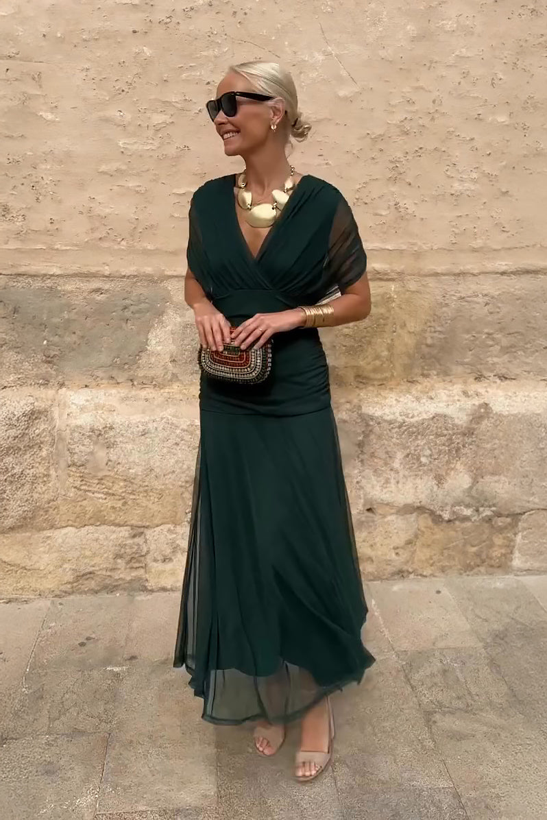 Elegant women's flowing V-neck maxi dress, perfect for parties, evening events & special occasions.