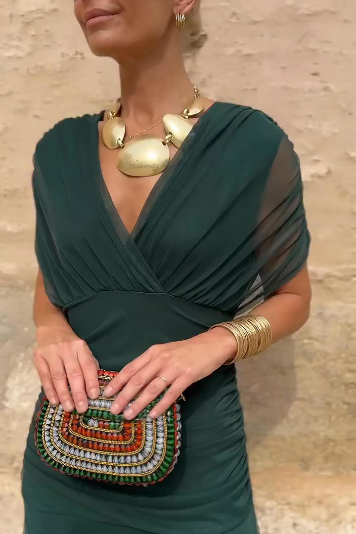 Luxurious flowing women's long dress with V-neck, an elegant choice for any party or celebration.