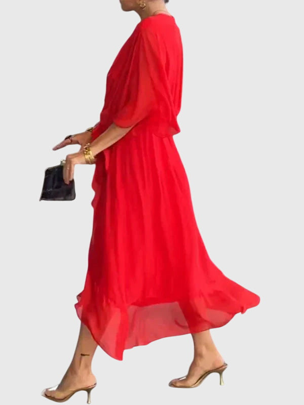 Graceful women's flowy maxi dress, perfect for elegant summer parties or special occasions. V-neck.