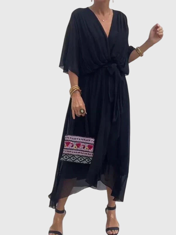 Versatile women's maxi dress with a flattering V-neck, elegant flowy fabric, ideal for summer parties.