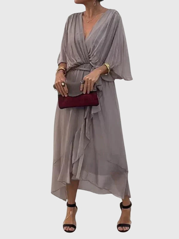 Beautiful women's party maxi dress with a flattering V-neck. Elegant, flowy, and comfortable design.