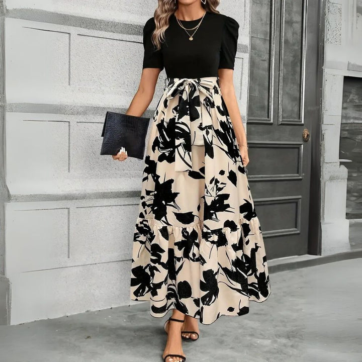 Elegant women's flowy maxi dress, perfect for stylish comfort & versatile summer wear.