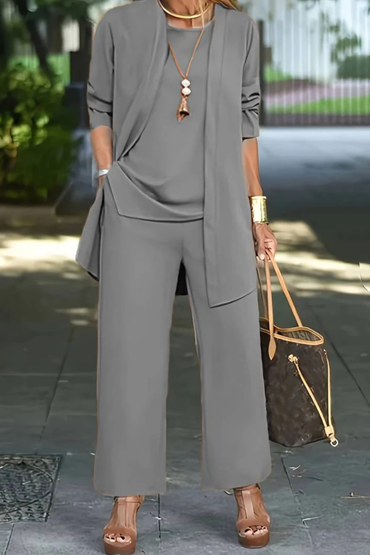 Fashionable women's 3-piece formal outfit, elegant attire for a sophisticated & confident look.
