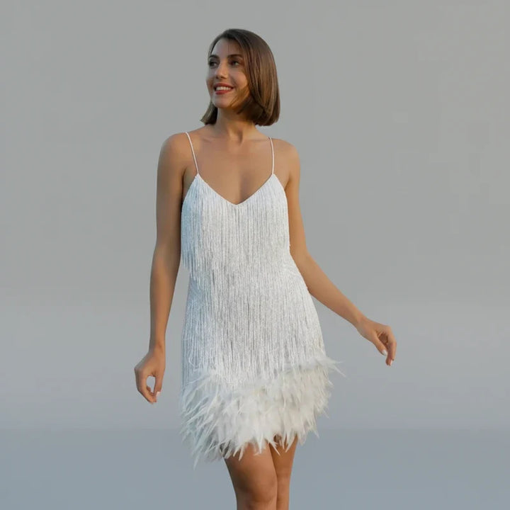 Daring black fringe mini bodycon dress for women, ideal for evening events, parties & club nights. Statement style.