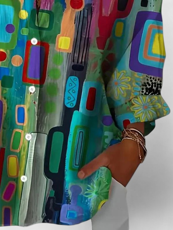 Versatile geometric print blouse for women. A sophisticated, long-sleeve top perfect for elegant casual and office wear.