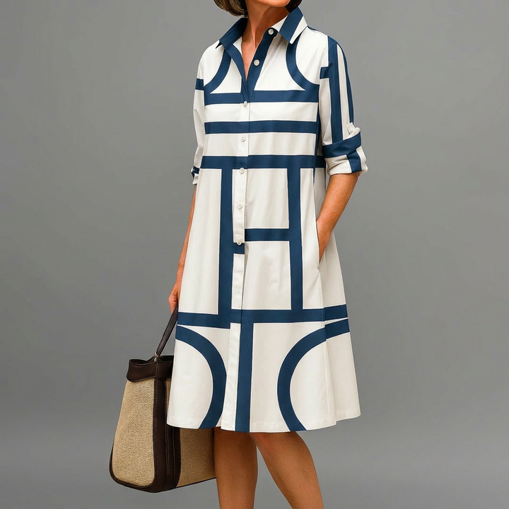 Elegant women's geometric print midi dress with collar & button-down front. Chic A-line style perfect for work or day.