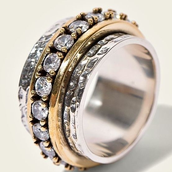 Elegant Women's Gold Zirconia Stone Ring, a sparkling fashion accessory for special occasions. Timeless style.
