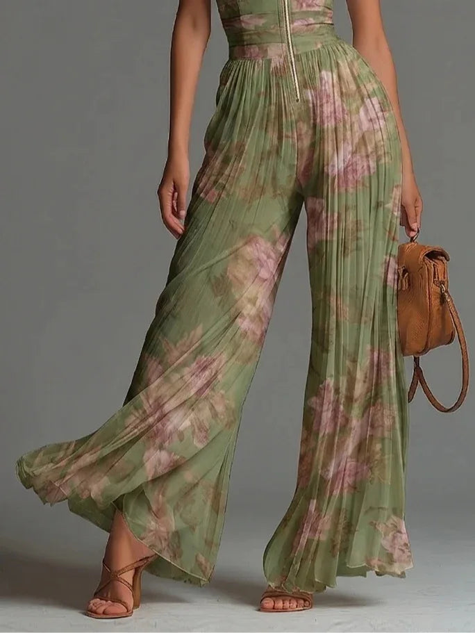 Women's elegant floral pleated wide-leg halter jumpsuit, a versatile statement piece for parties & vacation wear.
