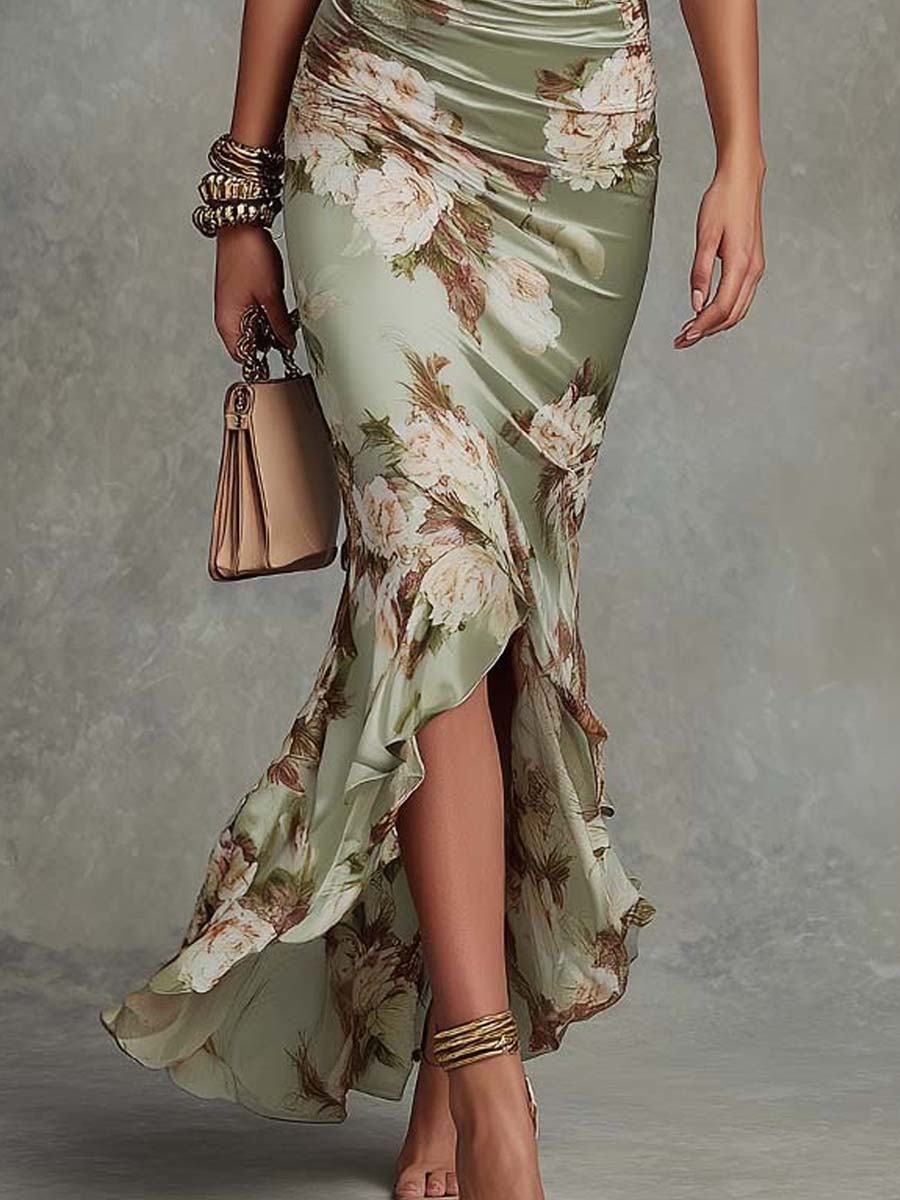 Elegant green flowing asymmetrical maxi dress for women. Perfect party or special occasion formal wear.