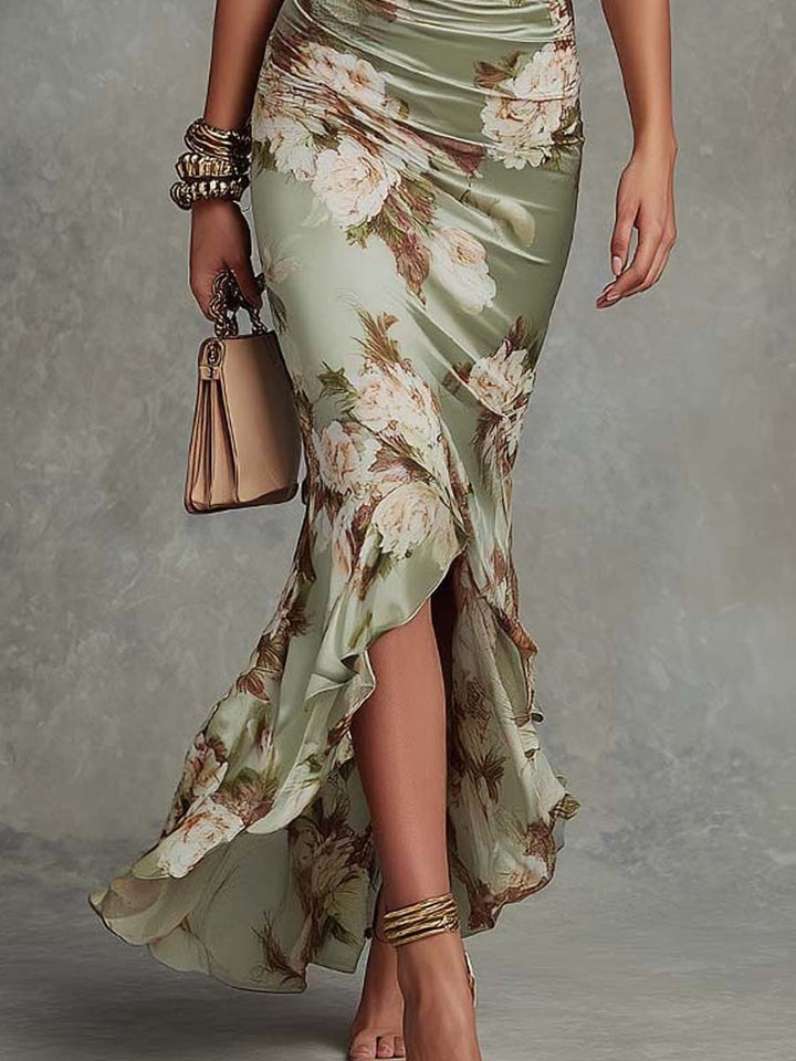 Elegant green flowing asymmetrical maxi dress for women. Perfect party or special occasion formal wear.