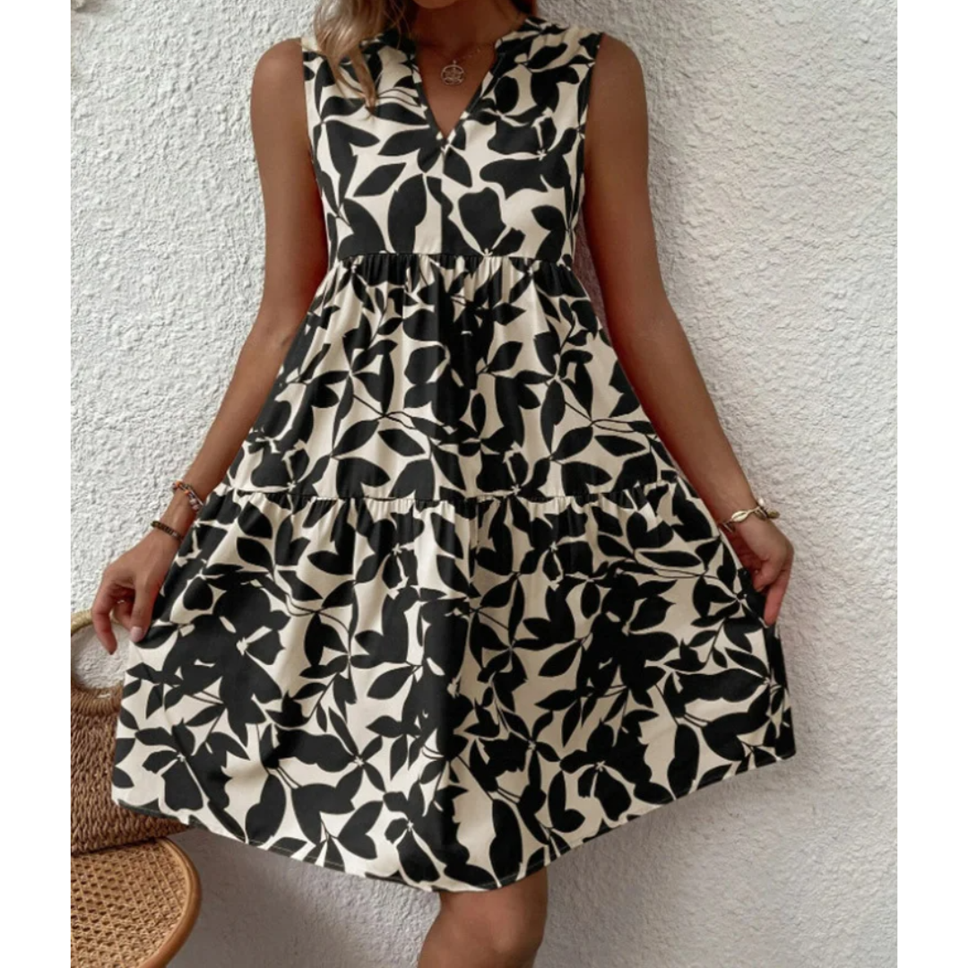 Versatile black midi dress for women, offering comfortable style from day to evening wear. An elegant fashion choice.