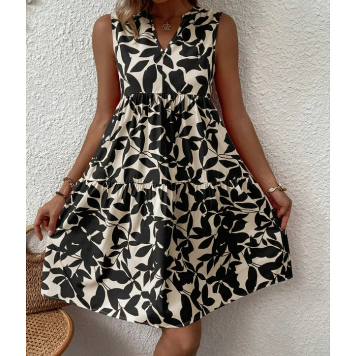 Versatile black midi dress for women, offering comfortable style from day to evening wear. An elegant fashion choice.
