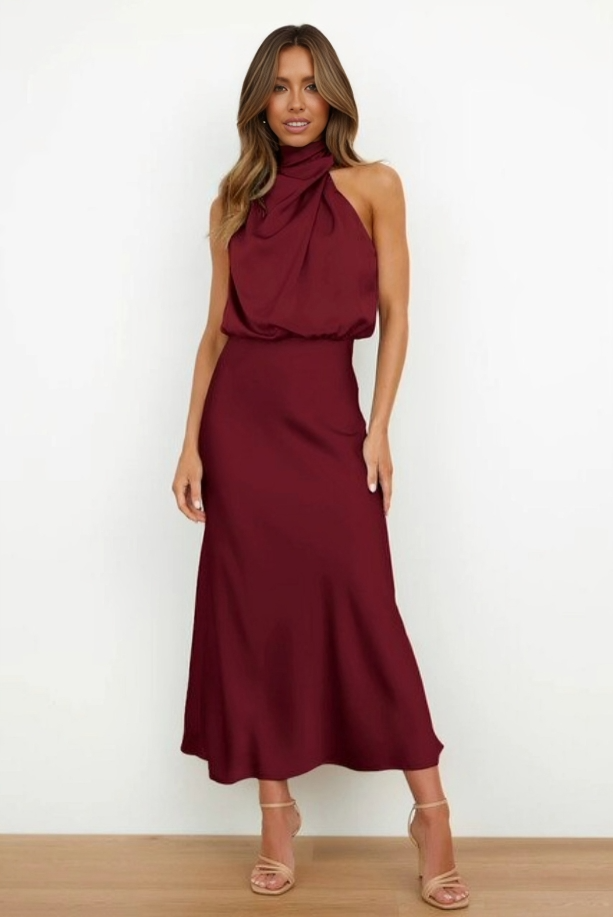 Versatile women's halter long dress, open back, flowing design, suitable for multiple formal occasions.