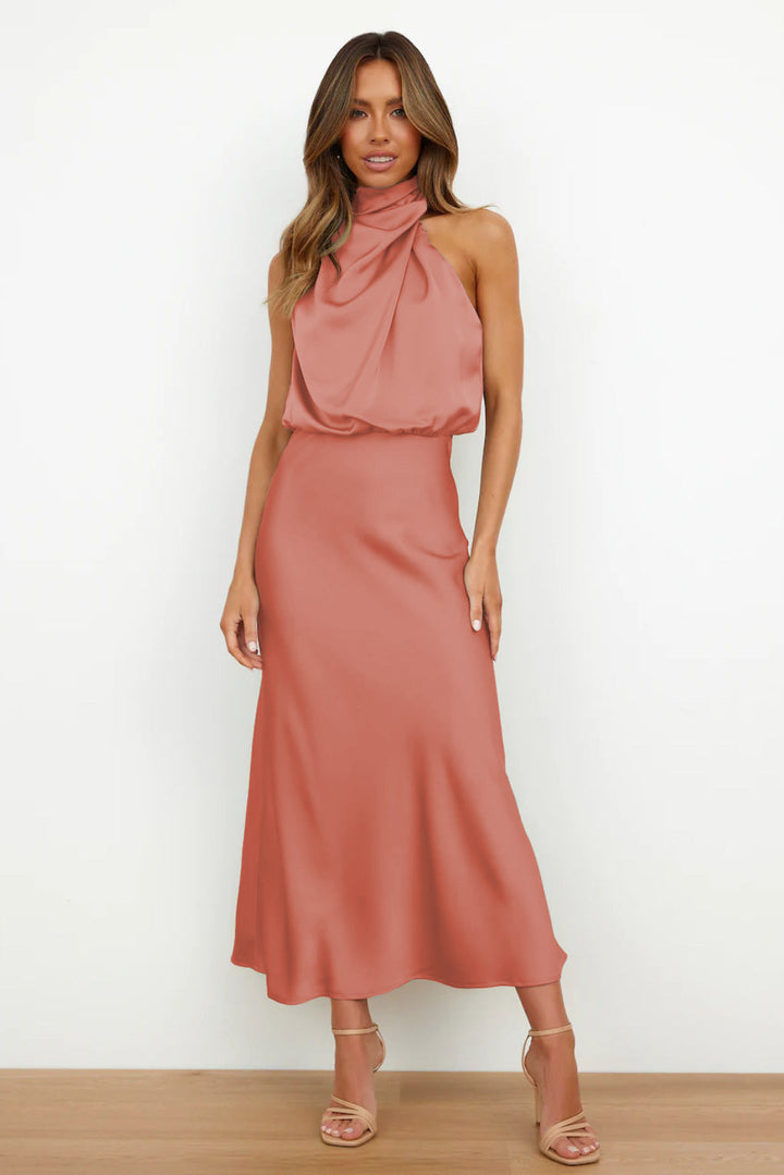 Classic black women's halter evening gown, open back, floor-length, elegant and sophisticated for galas.