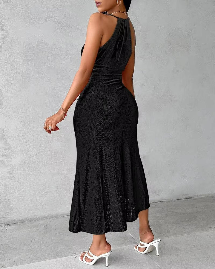Stunning women's party halter maxi dress with an A-line design & elegant side slit. Great for evening.
