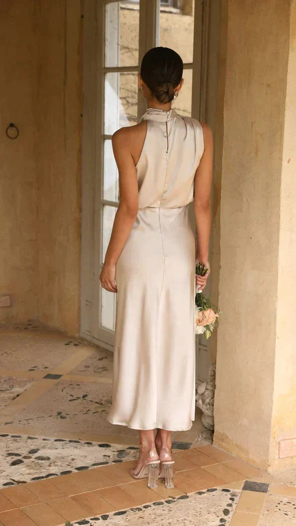 Flattering women's midi halter dress for formal events, parties & summer. Elegant and flowy design.