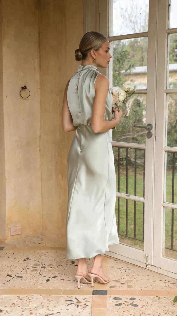Elegant formal women's halter midi dress. Flattering design, perfect for special occasions & parties.
