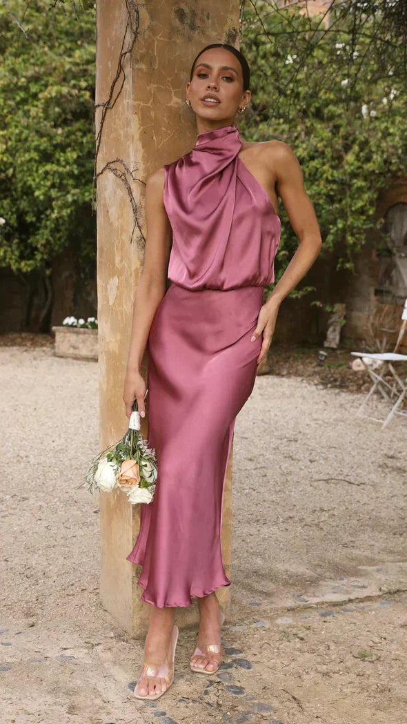 Stylish women's party halter midi dress. Elegant, flattering, and flowy for summer or formal occasions.