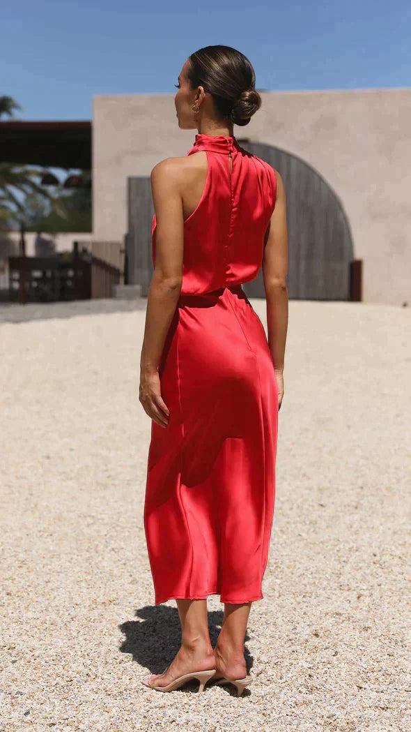 Flattering women's elegant midi dress with halter neckline. Ideal for formal, party, or summer occasions.