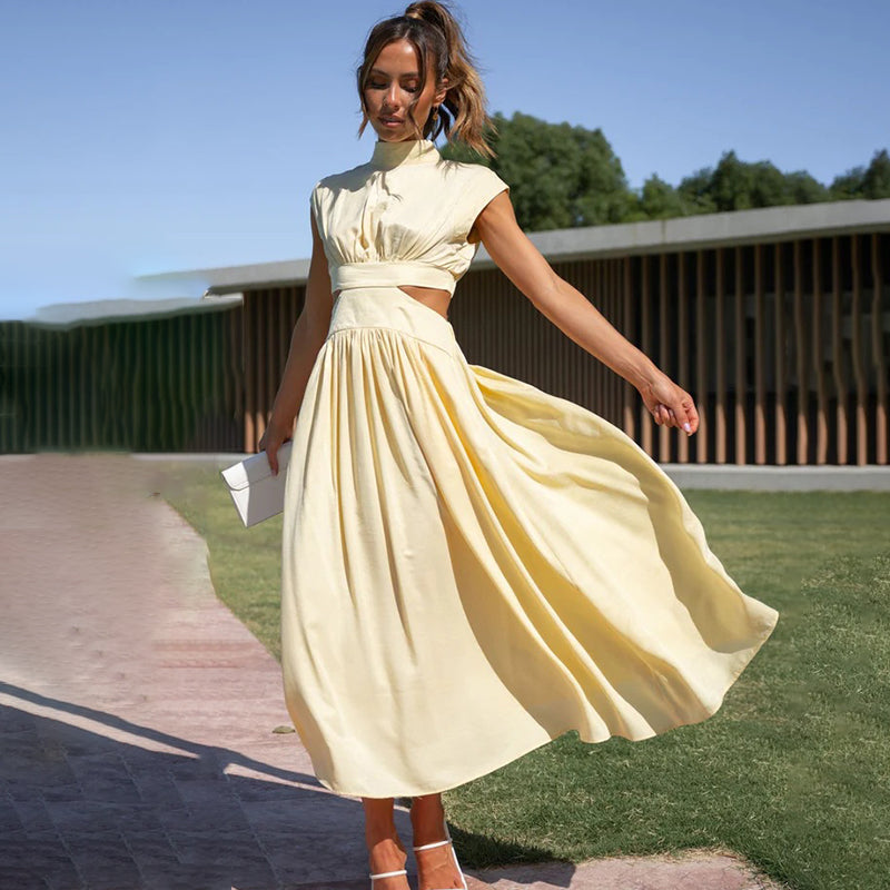 Fashionable women's elegant halter dress, designed for versatile summer looks, featuring adjustable straps.