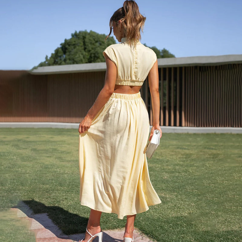 Beautiful women's midi halter dress for summer, offering elegant style and comfort with a flattering side slit.