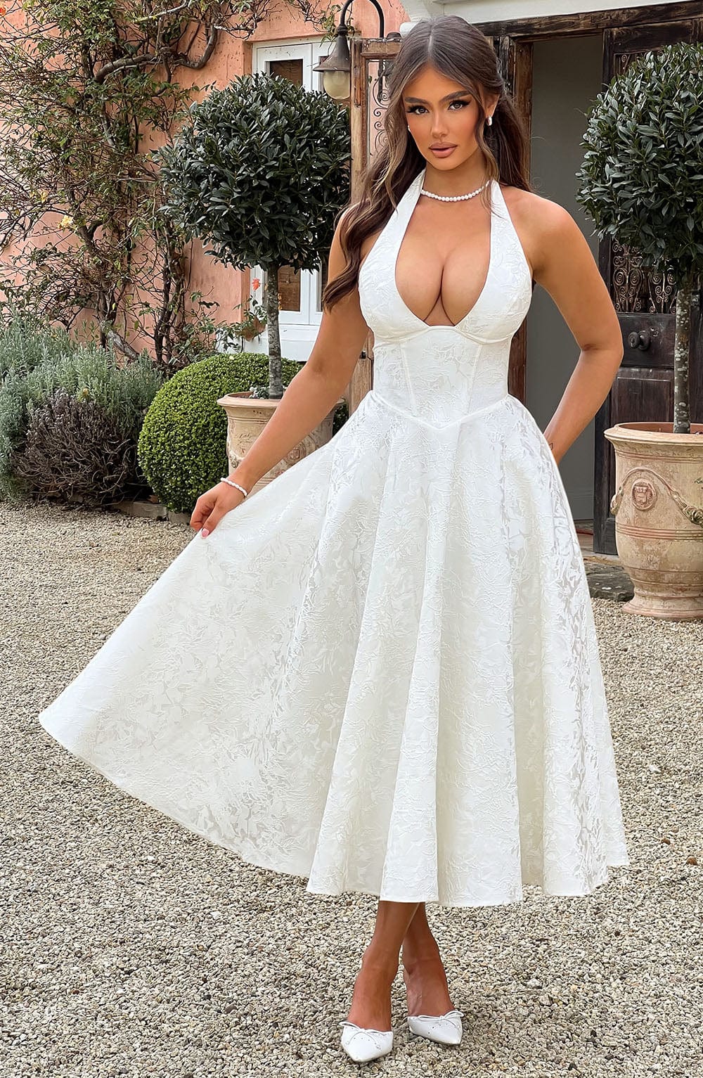 Chic corset halter midi dress, perfect as an elegant wedding guest or formal party dress for women.