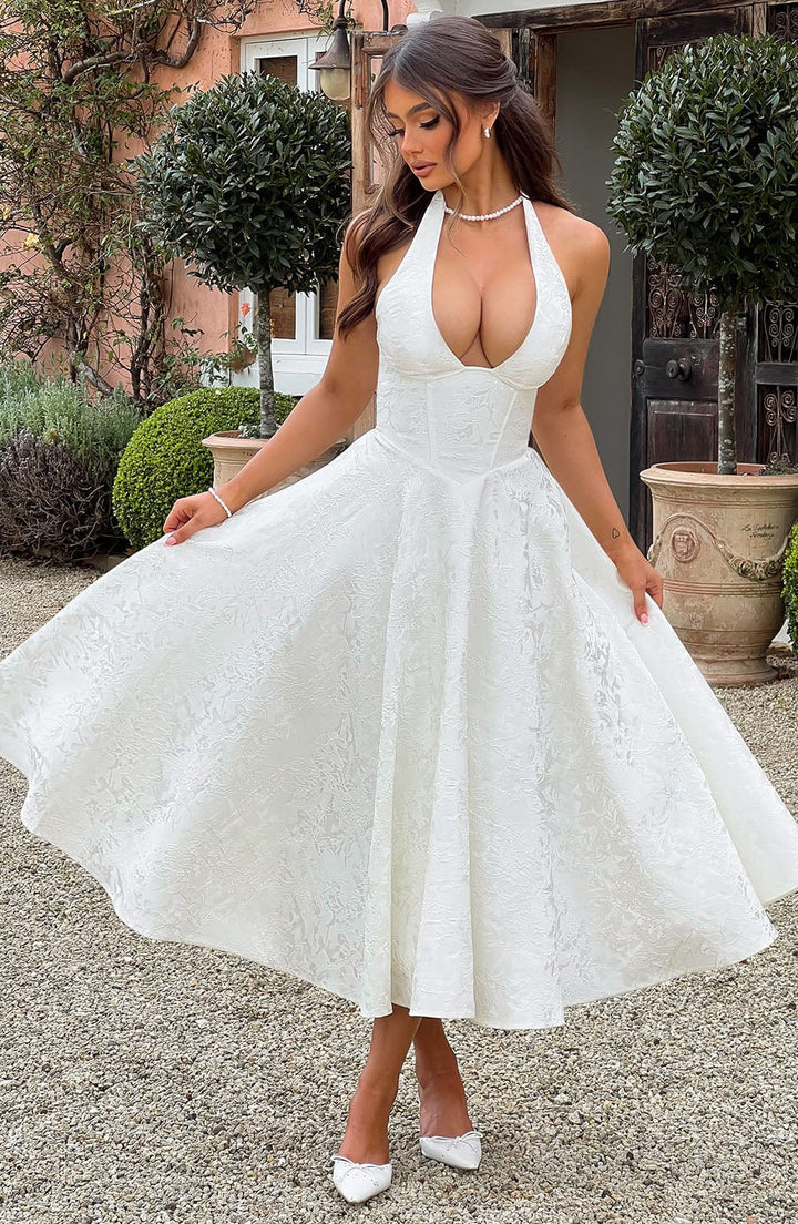 Flattering women's elegant halter corset midi dress with an A-line skirt, ideal for wedding guests & parties.