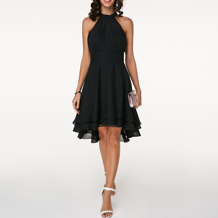 Versatile women's sleeveless halter mini dress with an elegant fluid drape, great for fashion and events.