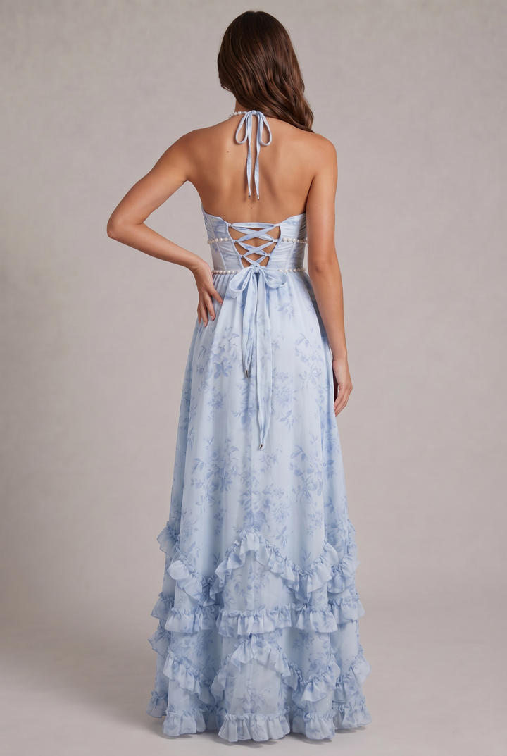 Sophisticated women's halter neck floral maxi dress, an elegant evening or occasion dress with a flowy skirt.