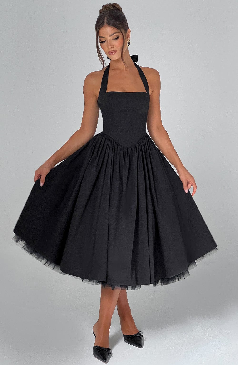 Flattering A-line midi party dress with a stylish halter neckline.