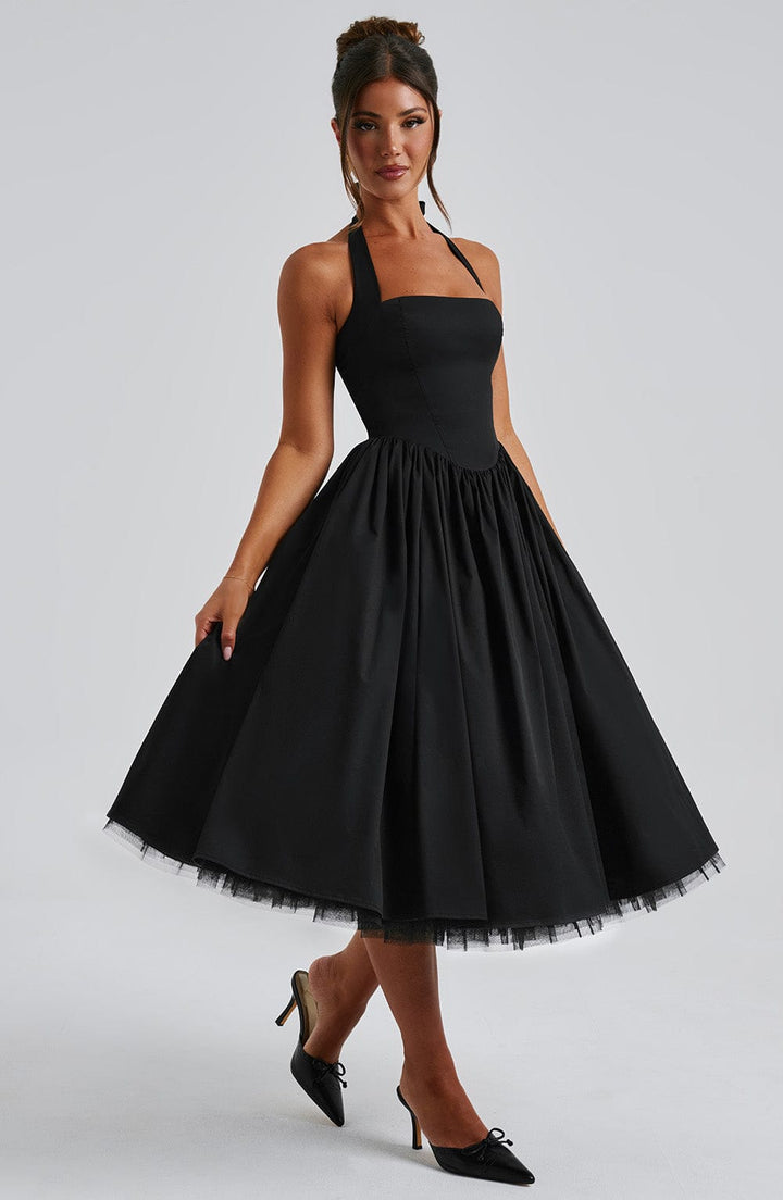 Chic formal evening dress for women, halter neck and midi length design.