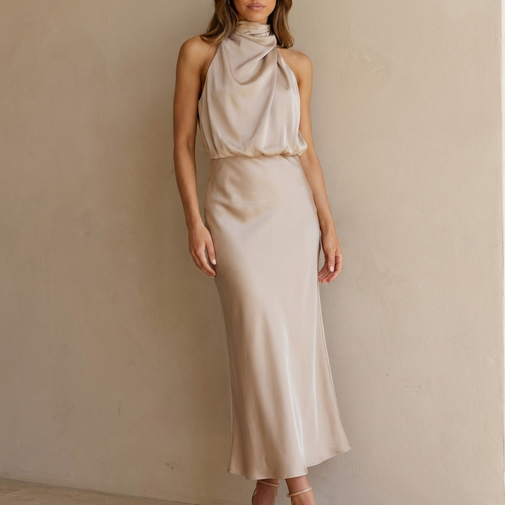 Elegant women's halter neck midi dress with draped blouson waist, perfect for evening wear & formal events.