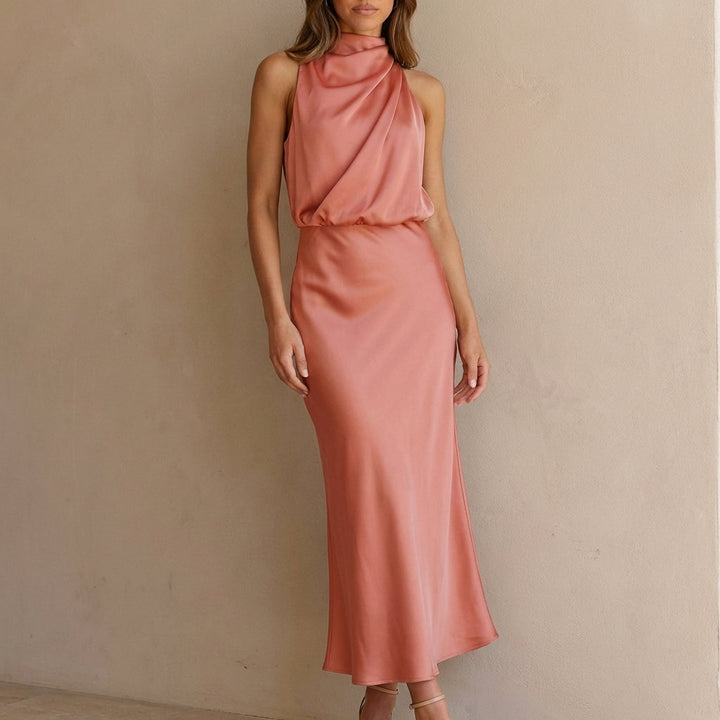 Women's draped blouson halter neck midi dress, sophisticated evening wear for formal and elegant events.