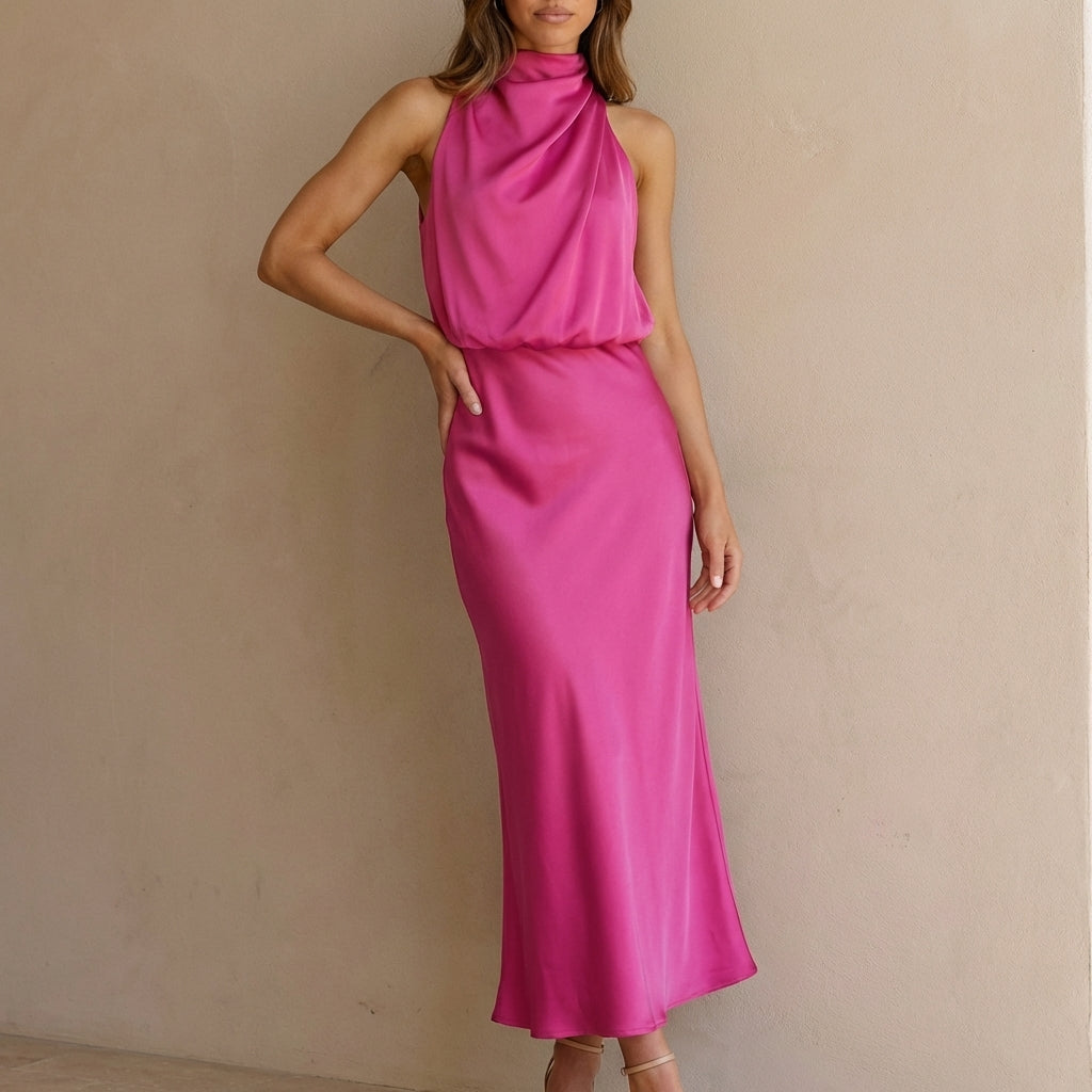 Sleek women's sleeveless halter neck midi dress with a draped waist, perfect for cocktail and evening.