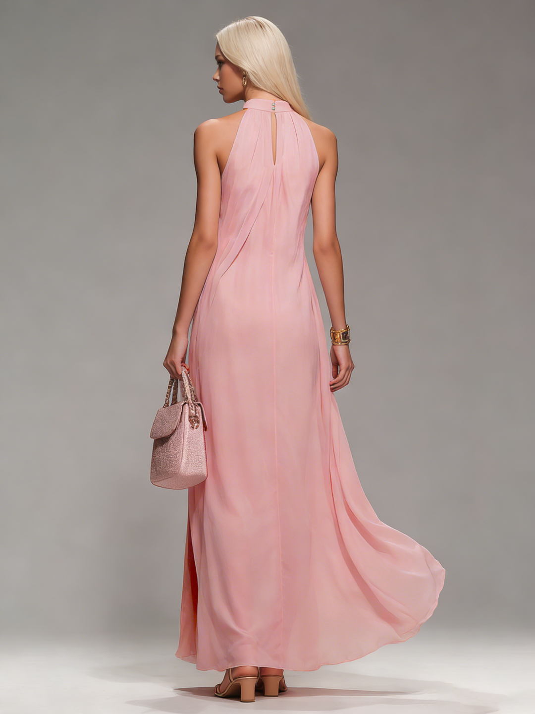 Flowy women's halter neck maxi dress with a sexy slit, ideal for elegant summer events, evening wear, or parties.