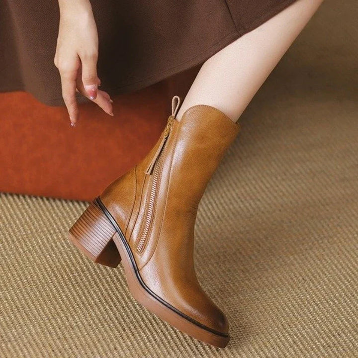 Stylish women's ankle boots with a high heel and functional zipper, ultimate elegant footwear.