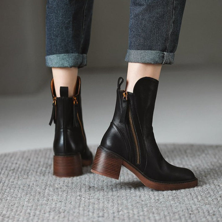 Women's formal high heel ankle boots, designed for elegance and ease with a side zipper.