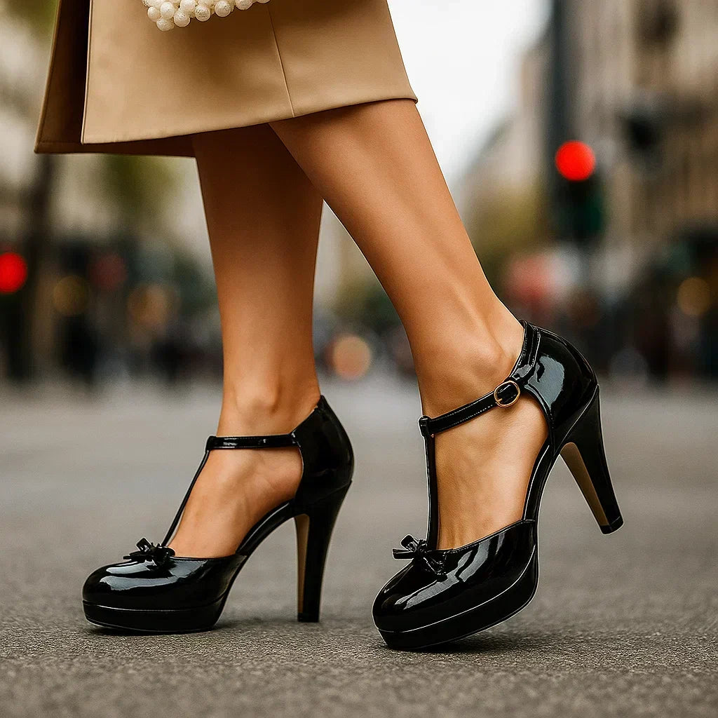 Fashionable women's dress heels with a charming bow detail and supportive ankle strap for a chic look.