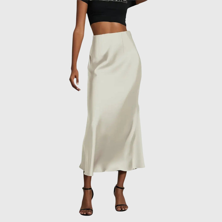 Chic women's long bias cut maxi skirt with a flattering high waist, ideal for both casual and formal wear.